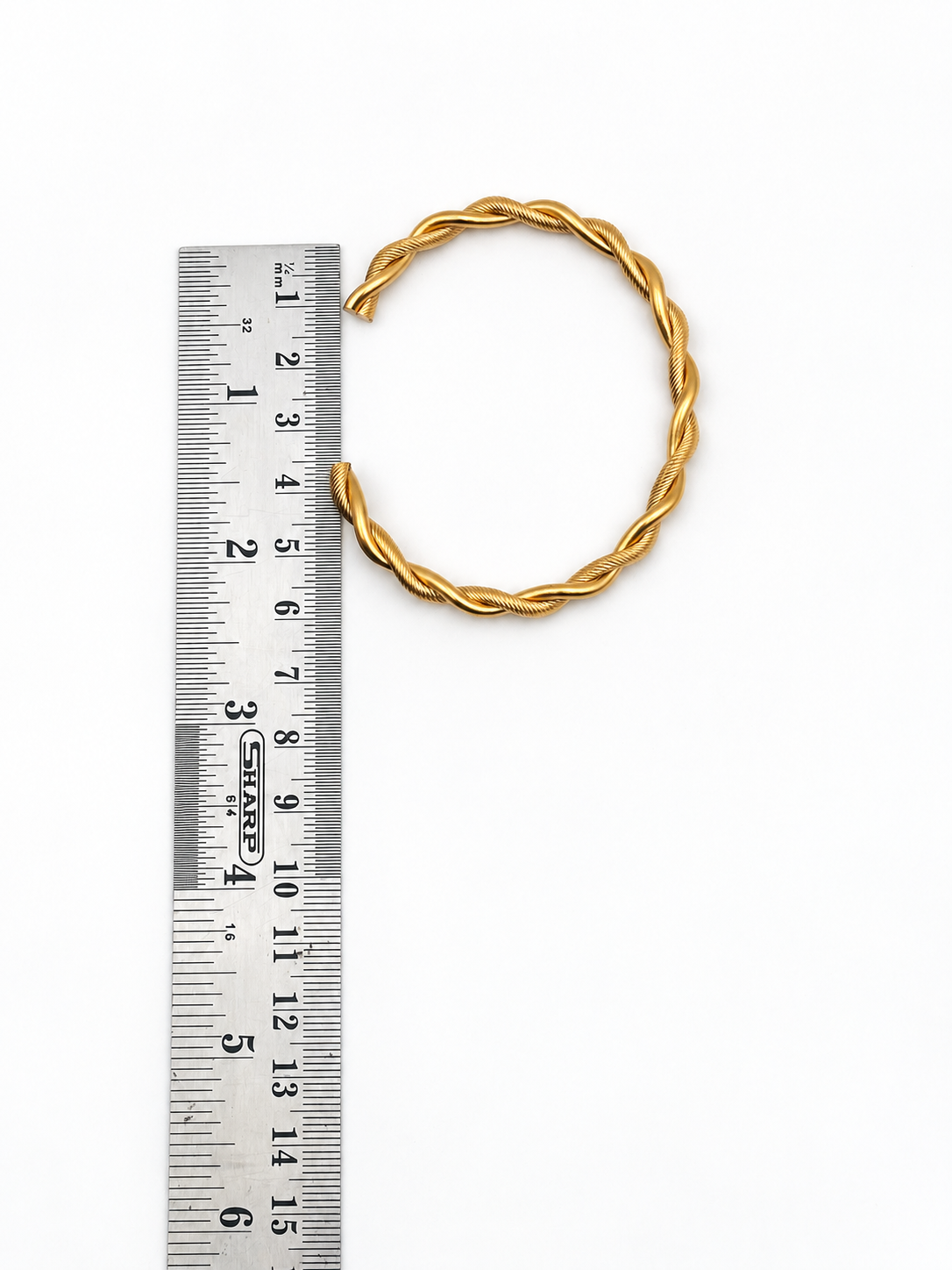 The Dual-Tone Twist Bangle